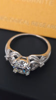 Hearts Desire - 2ct Round Moissanite Ring with Heart Accents Gold Plated Sterling Silver 925