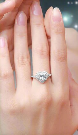 Heart shaped ring on hand