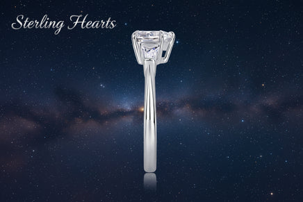 Silver ring with a large diamond on a white background